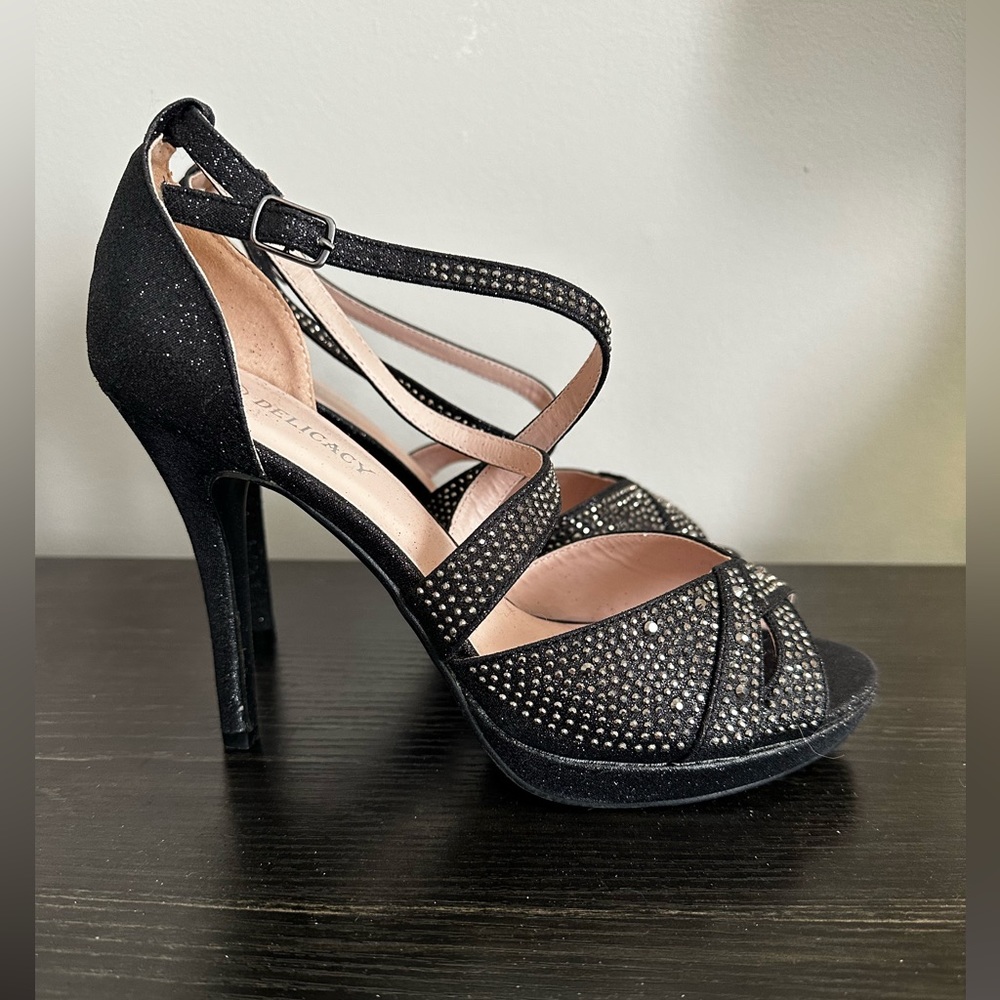 Delicacy stilettos. Never worn. Size 9